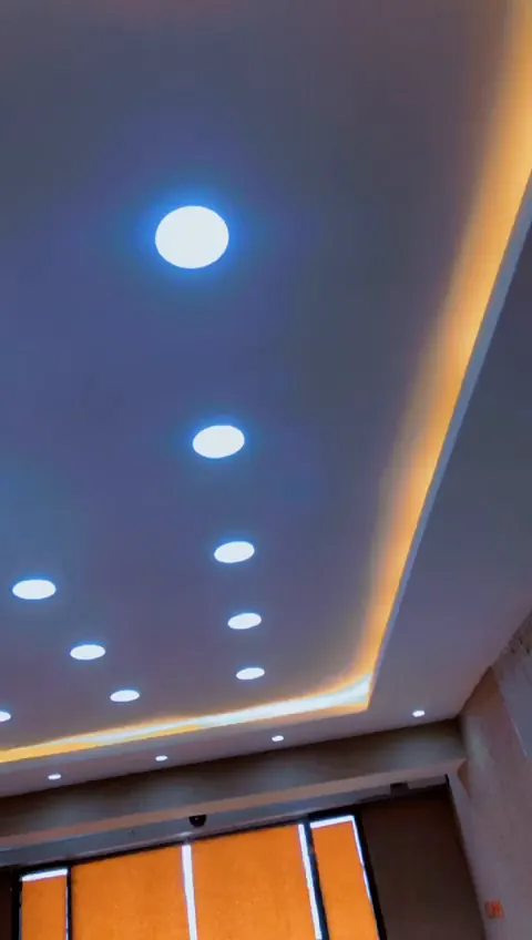 Interior ceiling wiring being checked before finishing
