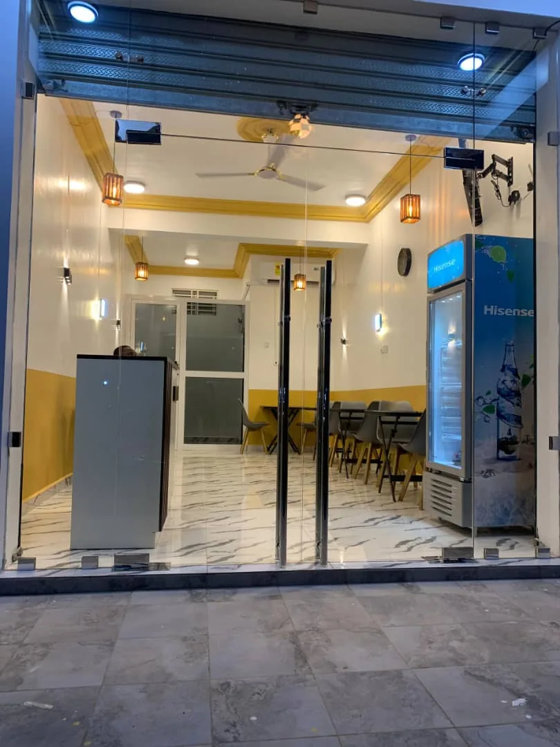 Cravenco commercial storefront with lights switched on